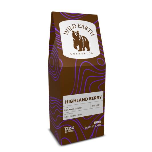 Coffee bag of Highland Berry from Wild Earth Coffee Co. with a brown and purple topographical design . The brown bear logo is on a white background