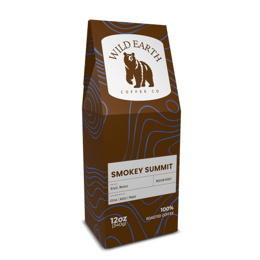Coffee bag of Smokey Summit from Wild Earth Coffee Co. with a  brown bear logo on a brown background with a blue topographical map.