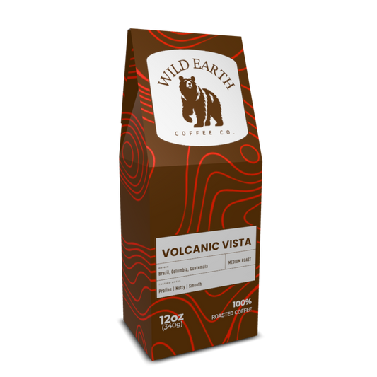 Coffee bag  of Volcanic Vista from Wild Earth Coffee Co. with a bear logo on a white background and red topographic map on a brown background.